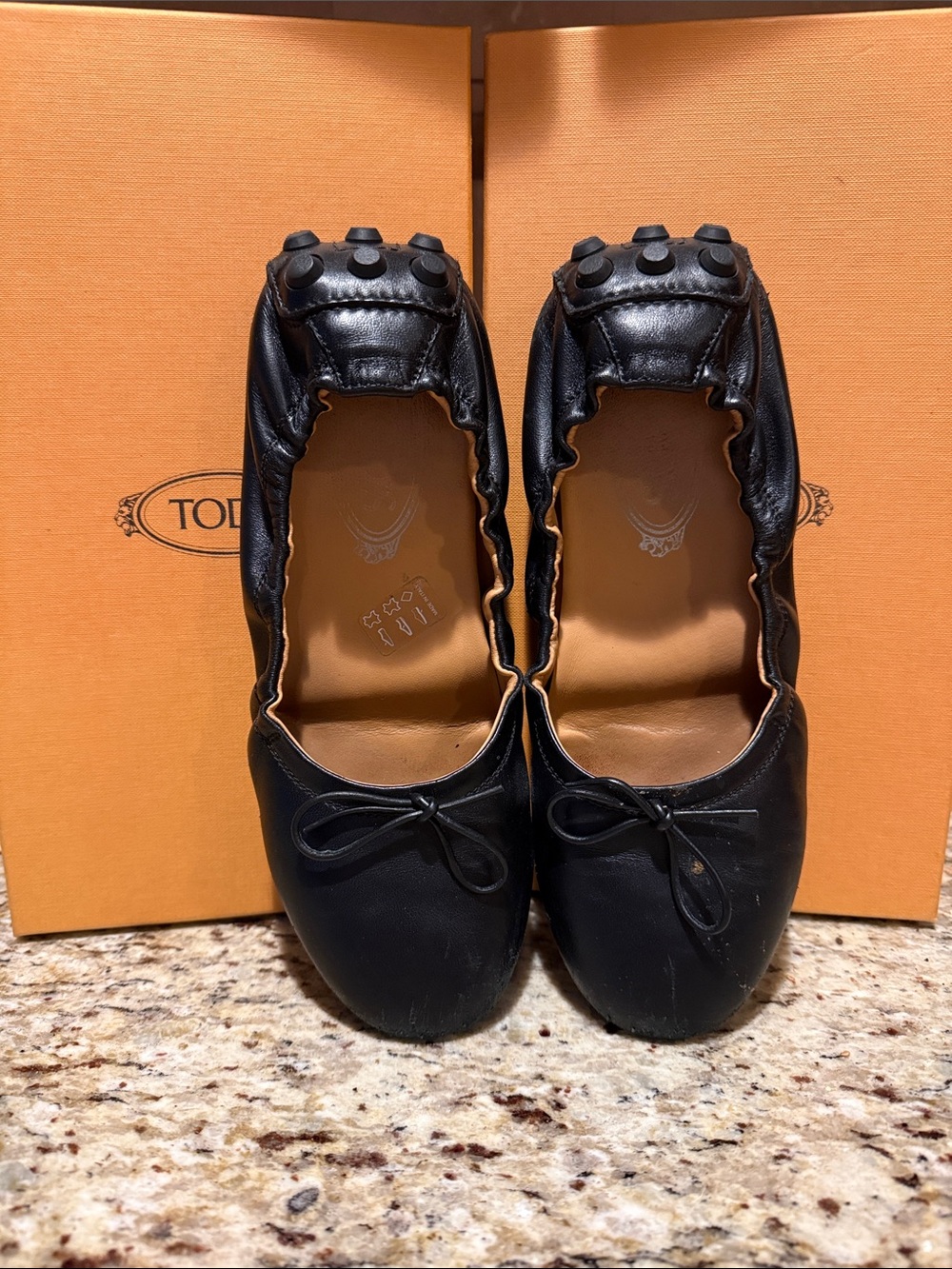 Tod's Black Leather Gommino Ballet Flats with Pebbled Heel